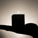 candle, hand, candlelight-335965.jpg